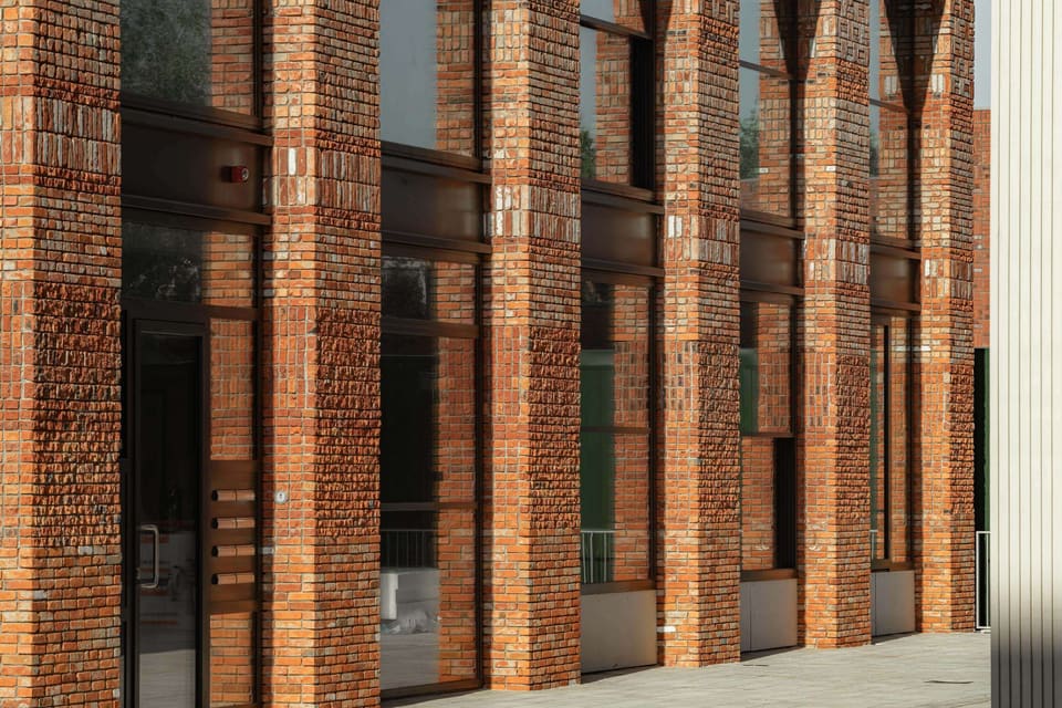 Recycled-brick piers with varied surface textures